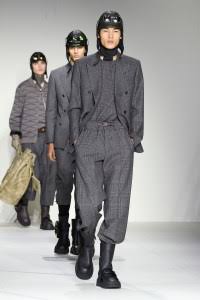 For Armani's Emporio Armani show for Fall/Winter 2022 he showed his military collection by designing military boots, jackets and belts that wrapped around the waist .