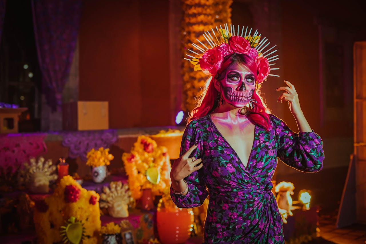 October 2025 HoroscopesAn artistic portrayal of Día de los Muertos with colorful makeup and traditional attire in Mexico City.