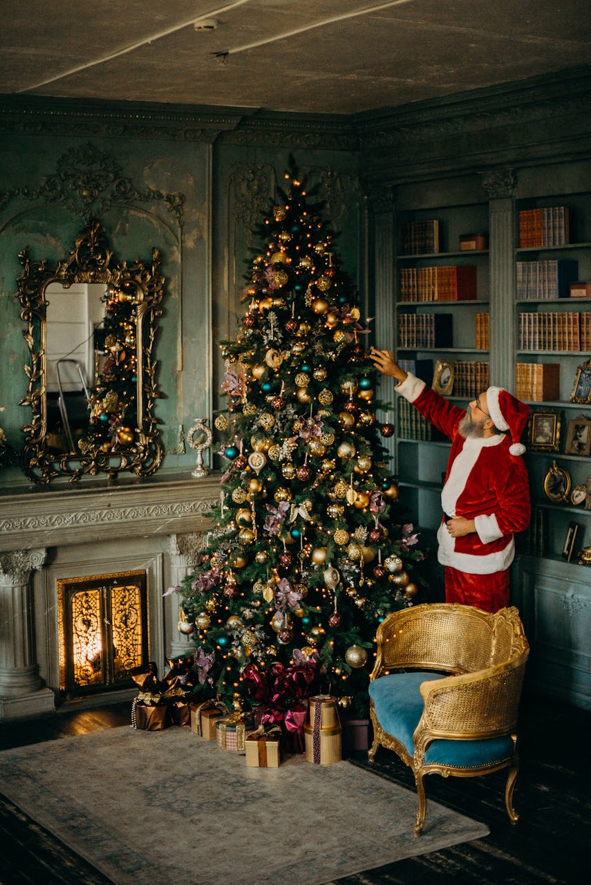 December 2025 Horoscope: Closing the Cycle 9 & Numerology ForecastDecember 2025 Horoscope: Closing the Cycle 9 & Numerology ForecastSanta Claus decorates a Christmas tree in an elegant living room, reflecting festive cheer.