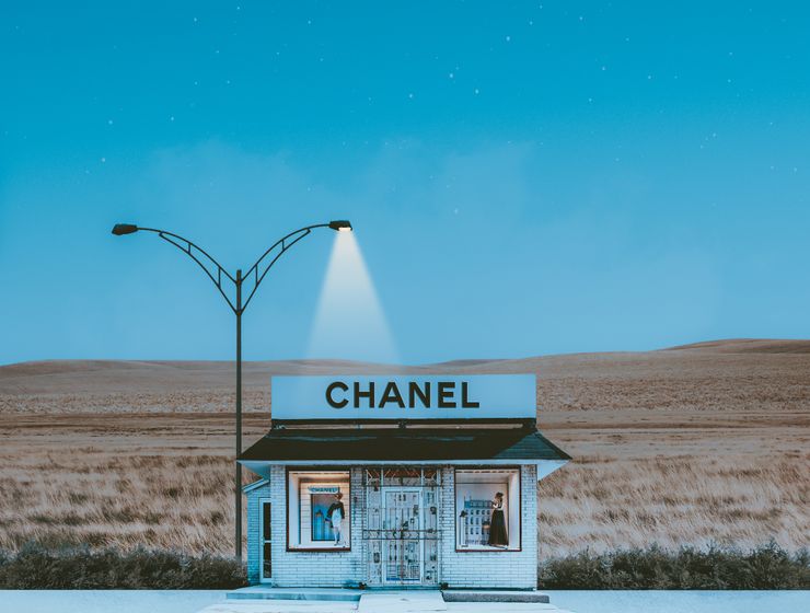Focus Keyphrase: August 2026 Horoscopes Claudia VanniniA minimalistic Chanel store illuminated by street lamps under a crescent moon and starry night sky.
