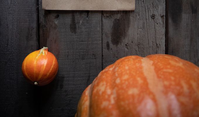 Style Cartel October 2026 Horoscopes by Claudia VanniniRustic October 2020 calendar with pumpkins on a wooden background, evoking a fall atmosphere.